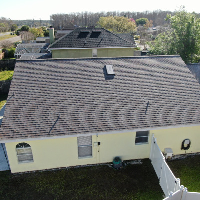 Shingle Roof, Gutters, & Skylight